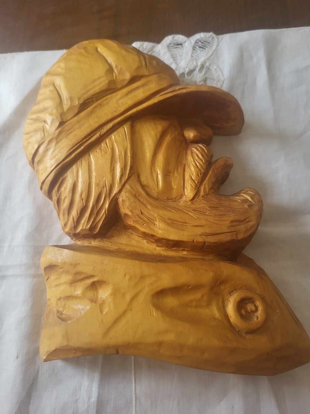 Detailed work in wood head of sailor with pipe by local artist in Matane , Qc